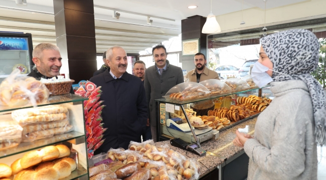 Büyükgöz ve Kaya, Yenikent Mahallesi'nde esnafları ziyaret etti