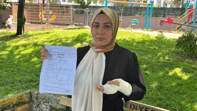 Yolun karşısına geçmek isteyen kadın oğluyla birlikte araçtan inen 3 kişi tarafından darp edildi