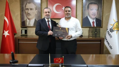 Başkan Şakar’a sertifikasını Başkan Talus takdim etti