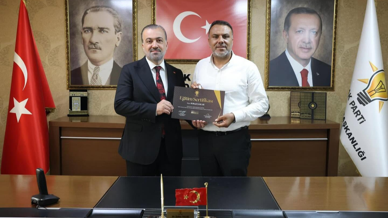 Başkan Şakar’a sertifikasını Başkan Talus takdim etti