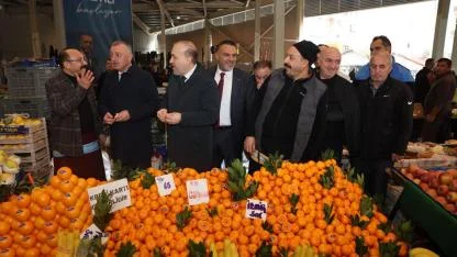 Başkanlar, pazarcı esnafının sofrasına konuk oldu